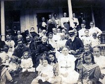 Makely Family Reunion Ethel Karr sitting on the ground holding a little girl. Submitted by Barbara Quider.